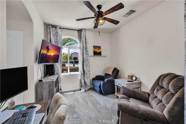7988 Borrego Ct, Yucca Valley, CA 92284 - living area with a ceiling fan, carpet, and baseboards