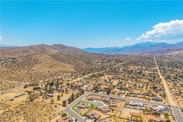 7988 Borrego Ct, Yucca Valley, CA 92284 - drone / aerial view of a mountainous background and a desert landscape