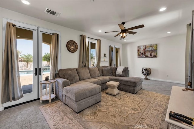 7988 Borrego Ct, Yucca Valley, CA 92284 - carpeted living room with french doors, a ceiling fan, recessed lighting, and baseboards