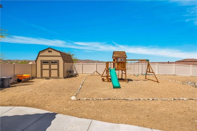 7988 Borrego Ct, Yucca Valley, CA 92284 - view of jungle gym with a fenced backyard