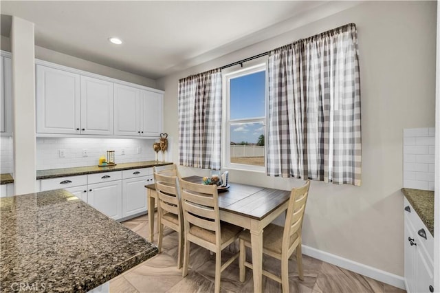 7988 Borrego Ct, Yucca Valley, CA 92284 - dining room with baseboards and recessed lighting