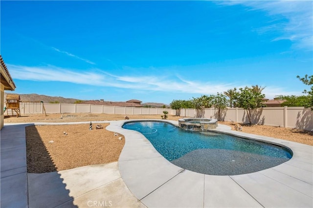 7988 Borrego Ct, Yucca Valley, CA 92284 - view of pool featuring a fenced backyard and a pool with connected hot tub