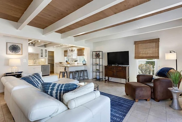 181719 Coast Blvd, Del Mar, CA 92014 - living room with light tile patterned floors, wood ceiling with exposed beams, and baseboards