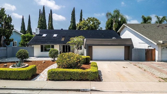 11217 Stonecress Ave, Fountain Valley, CA 92708 - view of front of house featuring an attached garage and driveway