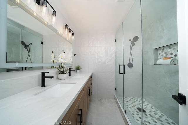 11217 Stonecress Ave, Fountain Valley, CA 92708 - full bathroom featuring double vanity, a shower stall, and tile walls