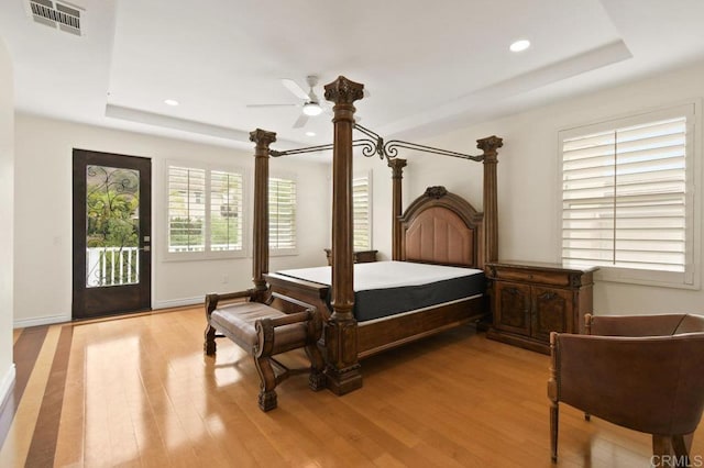 2413 Paseo, Los Gatos, Chula Vista, CA 91914 - bedroom with a tray ceiling, access to exterior, light wood-style flooring, and recessed lighting