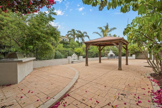 2413 Paseo, Los Gatos, Chula Vista, CA 91914 - fenced backyard featuring a gazebo, an outdoor kitchen, and a patio area