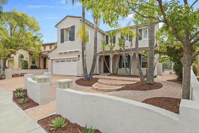 2413 Paseo, Los Gatos, Chula Vista, CA 91914 - view of front facade with stucco siding, an attached garage, and concrete driveway