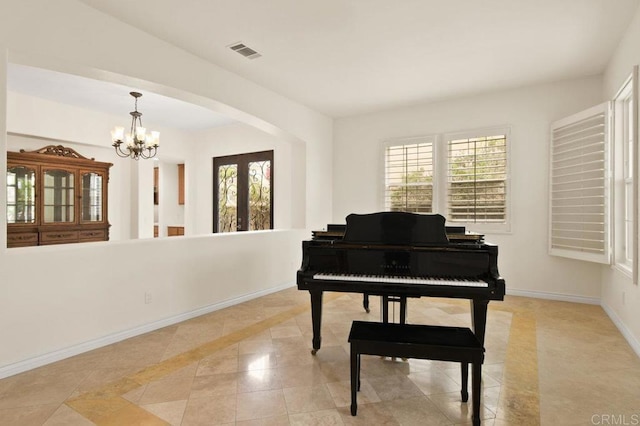 2413 Paseo, Los Gatos, Chula Vista, CA 91914 - sitting room with inlaid floor details, arched walkways, a chandelier, and light tile patterned flooring
