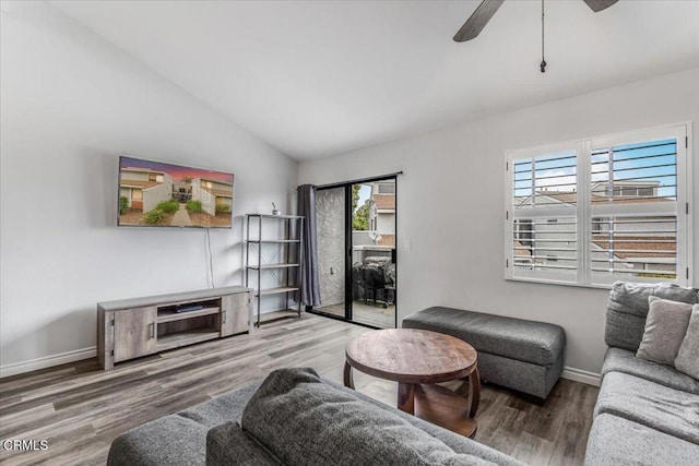 5206 Longfellow Way, Oxnard, CA 93033 - living room featuring wood finished floors, vaulted ceiling, a ceiling fan, and baseboards