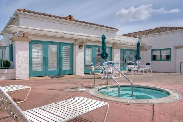 3376 Corsica Way, Oceanside, CA 92056 - view of pool featuring french doors, a hot tub, and a patio area