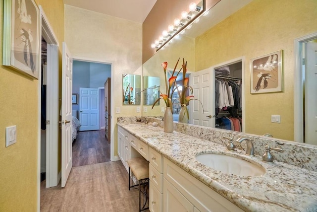 3376 Corsica Way, Oceanside, CA 92056 - full bath with double vanity, wood finished floors, and a walk in closet