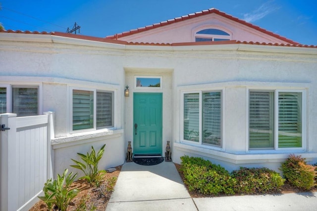 3376 Corsica Way, Oceanside, CA 92056 - doorway to property with a tiled roof and stucco siding