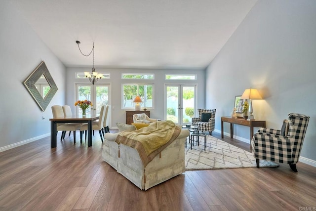 3376 Corsica Way, Oceanside, CA 92056 - living area with a chandelier, wood finished floors, and french doors