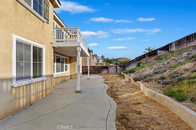 21567 Coral Rock Ln, Wildomar, CA 92595 - fenced backyard with a patio