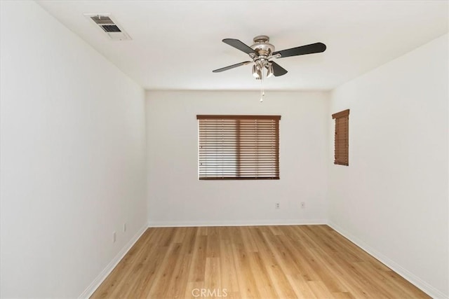 21567 Coral Rock Ln, Wildomar, CA 92595 - unfurnished room with a ceiling fan, light wood-style flooring, and baseboards