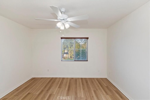 21567 Coral Rock Ln, Wildomar, CA 92595 - spare room featuring light wood finished floors, baseboards, and a ceiling fan
