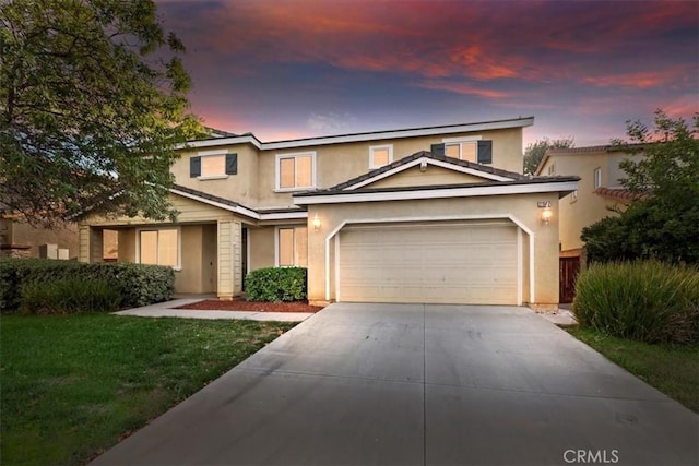 21567 Coral Rock Ln, Wildomar, CA 92595 - traditional-style home with concrete driveway, an attached garage, stucco siding, and a lawn