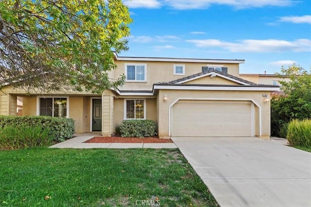 21567 Coral Rock Ln, Wildomar, CA 92595 - traditional home with a garage, stucco siding, concrete driveway, and a front lawn