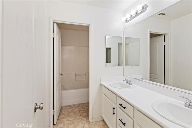 21567 Coral Rock Ln, Wildomar, CA 92595 - bathroom with double vanity and tile patterned floors