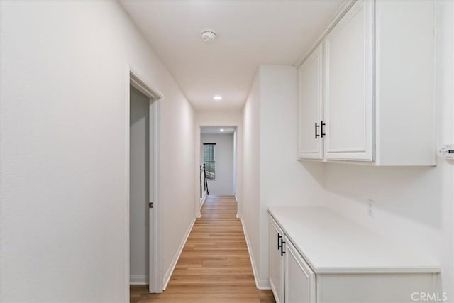 21567 Coral Rock Ln, Wildomar, CA 92595 - hall featuring light wood-style floors, baseboards, and recessed lighting