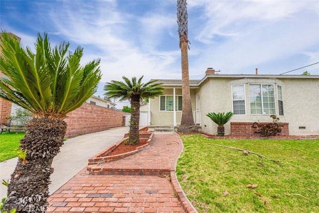 10113 Harvest Ave, Santa Fe Springs, CA 90670 - ranch-style home featuring stucco siding and a chimney