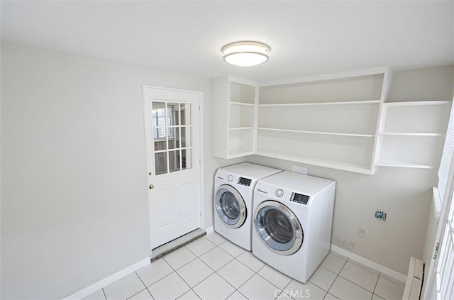 10113 Harvest Ave, Santa Fe Springs, CA 90670 - laundry room with independent washer and dryer, baseboards, and light tile patterned floors