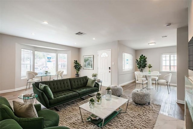 10113 Harvest Ave, Santa Fe Springs, CA 90670 - living area with baseboards, recessed lighting, and wood finished floors