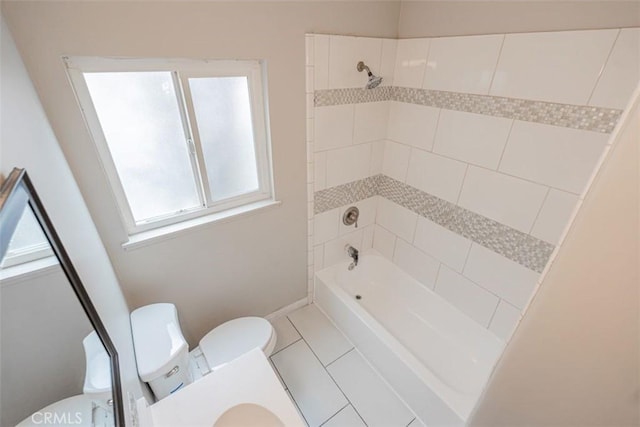 10113 Harvest Ave, Santa Fe Springs, CA 90670 - full bathroom with toilet, shower / washtub combination, tile patterned floors, and baseboards