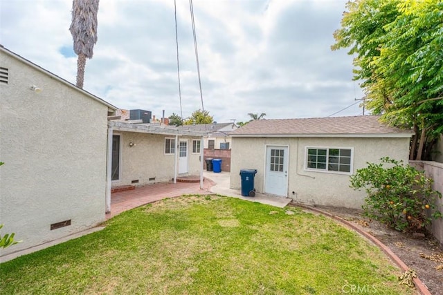 10113 Harvest Ave, Santa Fe Springs, CA 90670 - rear view of property with stucco siding and a patio