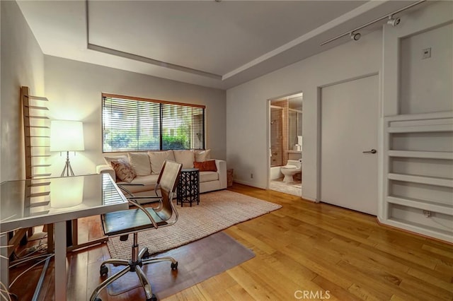12841 Bloomfield St Unit 103, Studio City, CA 91604 - home office with light wood-type flooring and a raised ceiling