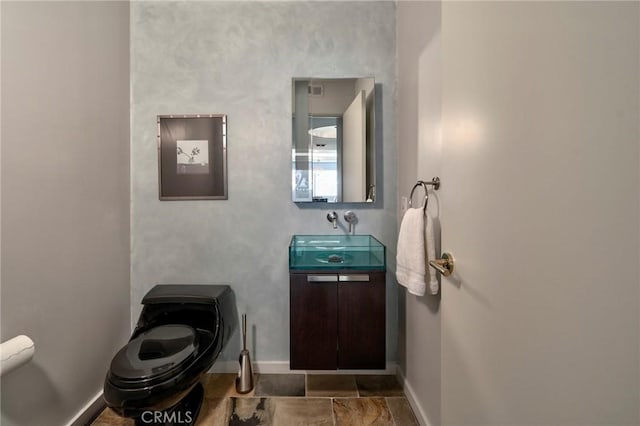 12841 Bloomfield St Unit 103, Studio City, CA 91604 - half bath with toilet, vanity, and baseboards