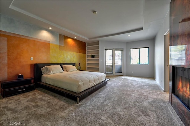 12841 Bloomfield St Unit 103, Studio City, CA 91604 - carpeted bedroom with access to outside, recessed lighting, and a tray ceiling