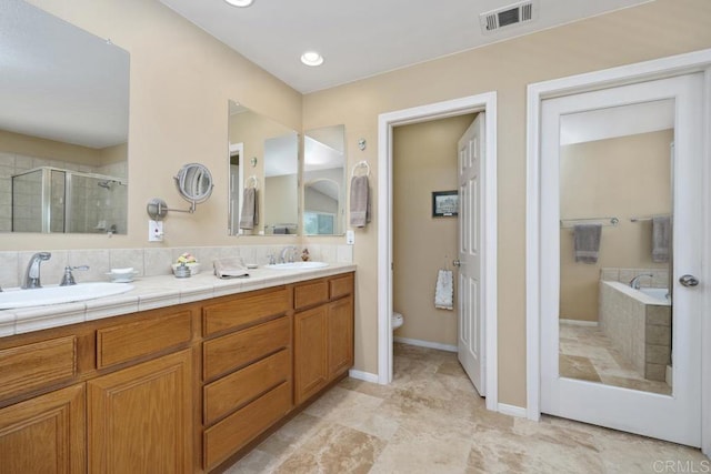 31135 Gleneagles Dr, Temecula, CA 92591 - full bathroom featuring double vanity, a stall shower, and a bath