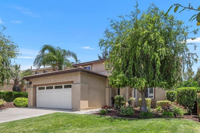 31135 Gleneagles Dr, Temecula, CA 92591 - mediterranean / spanish-style home featuring stucco siding, driveway, an attached garage, and a front lawn