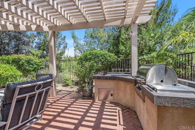 31135 Gleneagles Dr, Temecula, CA 92591 - fenced backyard with an outdoor kitchen, a pergola, and a patio area
