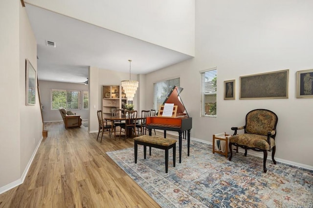 31135 Gleneagles Dr, Temecula, CA 92591 - sitting room featuring light wood-style flooring and a chandelier