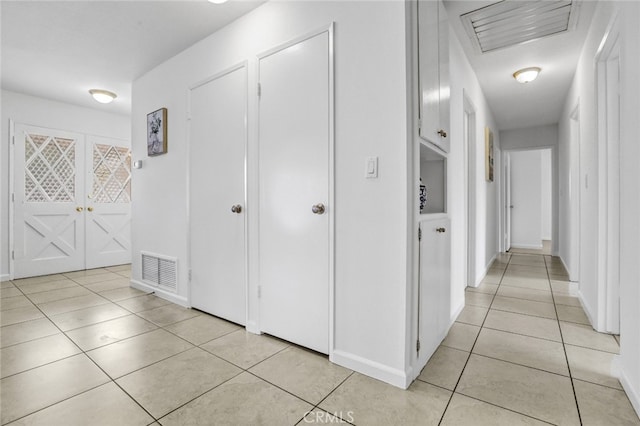 27142 Langside Ave, Canyon Country, CA 91351 - hallway featuring light tile patterned flooring and baseboards