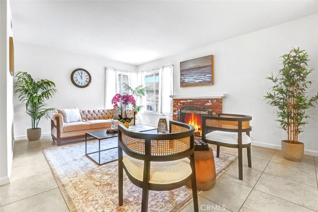 27142 Langside Ave, Canyon Country, CA 91351 - living room featuring a fireplace, light tile patterned flooring, and baseboards