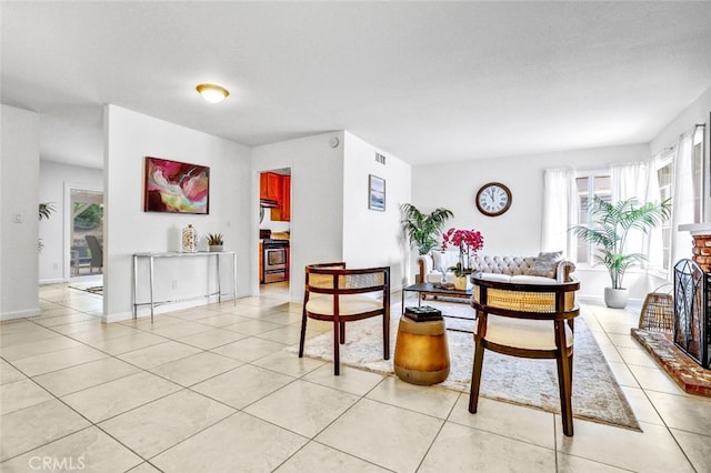 27142 Langside Ave, Canyon Country, CA 91351 - living area featuring light tile patterned flooring and a brick fireplace