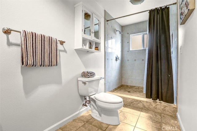 27142 Langside Ave, Canyon Country, CA 91351 - bathroom with toilet, a tile shower, and tile patterned flooring