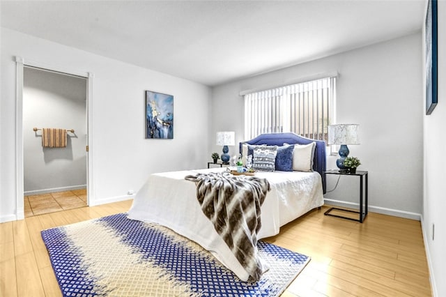 27142 Langside Ave, Canyon Country, CA 91351 - bedroom featuring light wood finished floors and baseboards