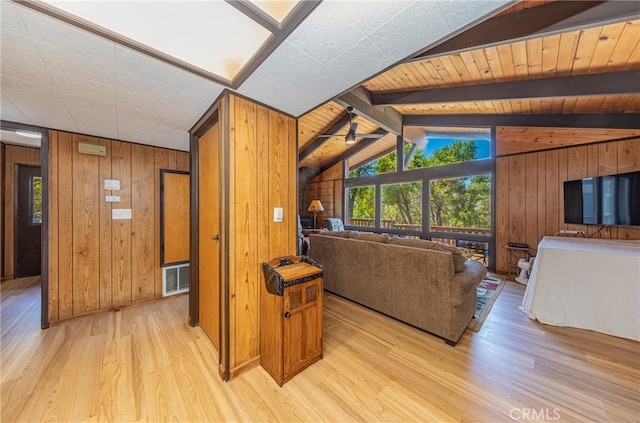 58632 Rainbow Dr, North Fork, CA 93643 - living room with light wood-style floors, wood walls, and ceiling fan