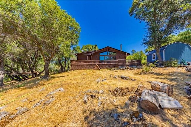 58632 Rainbow Dr, North Fork, CA 93643 - view of yard with a wooden deck