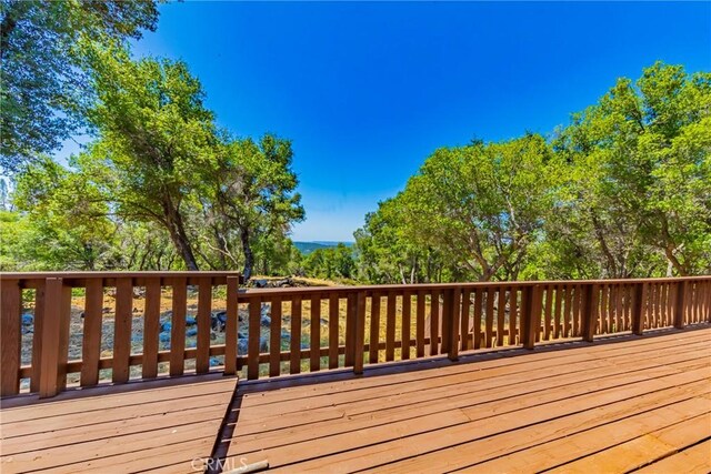 58632 Rainbow Dr, North Fork, CA 93643 - wooden terrace featuring a water view