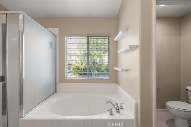 33010 Poppy St, Temecula, CA 92592 - full bathroom featuring a bath, toilet, and a stall shower