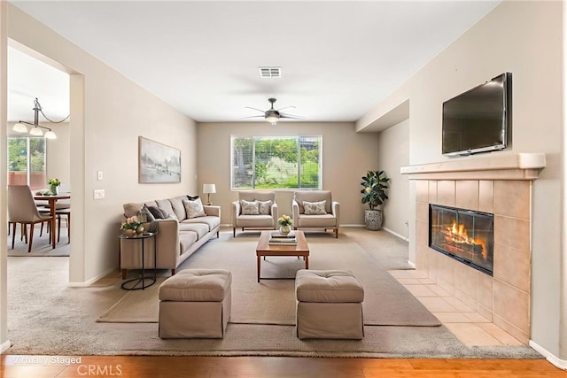 33010 Poppy St, Temecula, CA 92592 - living area featuring ceiling fan, a fireplace, and baseboards