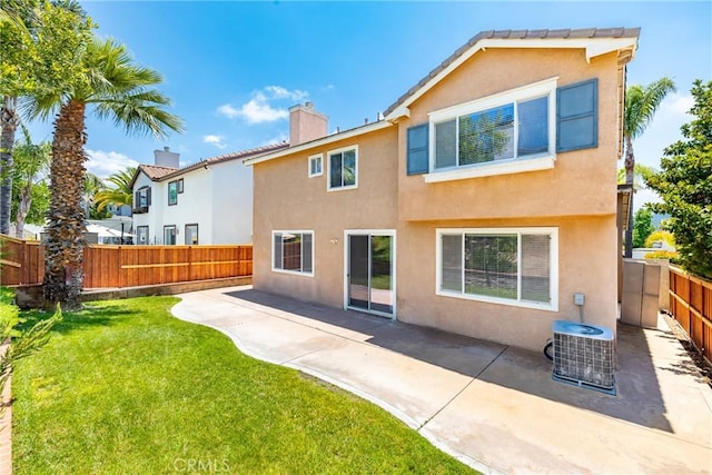 33010 Poppy St, Temecula, CA 92592 - rear view of house with a chimney, stucco siding, and a patio