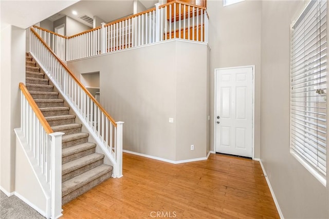 33010 Poppy St, Temecula, CA 92592 - entrance foyer featuring a towering ceiling, wood finished floors, baseboards, healthy amount of natural light, and recessed lighting