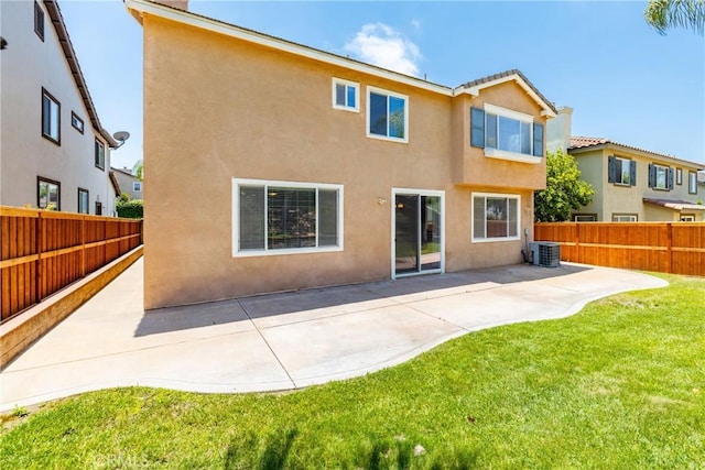 33010 Poppy St, Temecula, CA 92592 - back of house featuring cooling unit, stucco siding, and a patio area